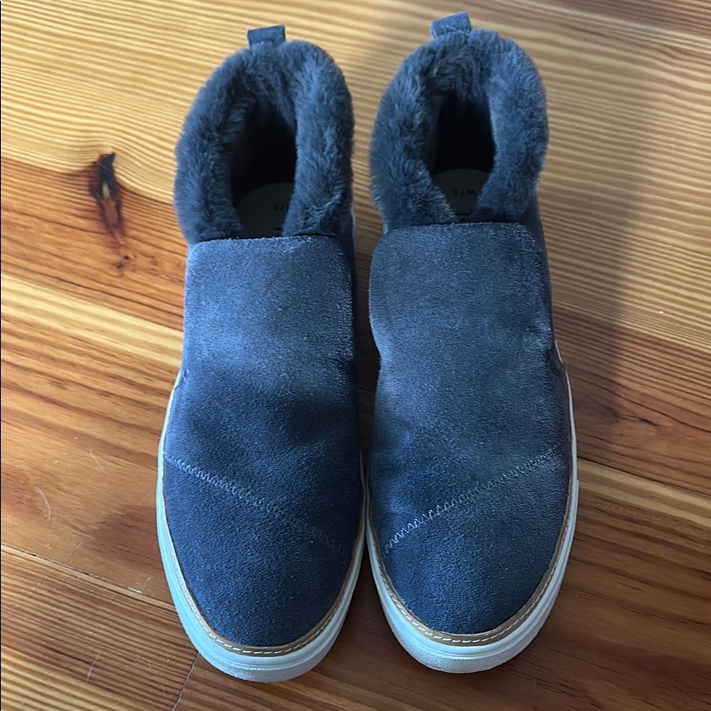 Tom’s Grey suede slip ons